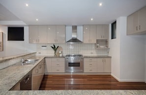 Microwave, oven, stovetop, dishwasher - Melbourne Beachfront Family Home with panoramic view (Black Rock)