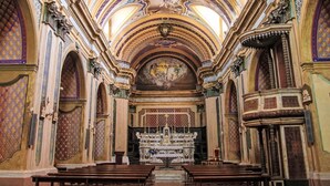 An ornate church interior with high ceilings, detailed frescoes, and a central altar. - Nice apartment for 2 guests with WIFI, balcony and pets allowed (Strongoli)