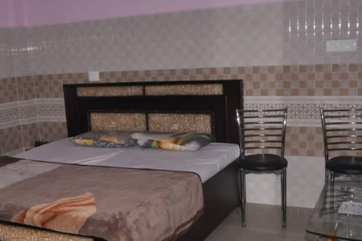 Deluxe Room, Garden View | Desk, free WiFi, bed sheets