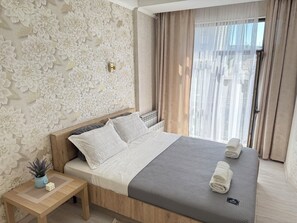 1 habitación, tabla de planchar con plancha, wifi y ropa de cama 