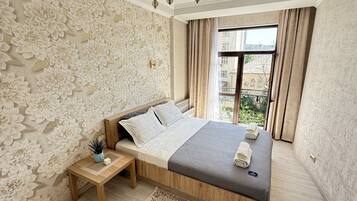 1 habitación, tabla de planchar con plancha, wifi y ropa de cama