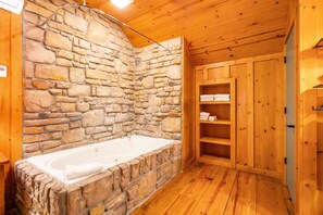 Shower, jetted tub, towels