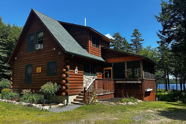 Full log cabin with mini split heat pump for heating and cooling.