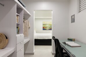 1 bedroom, desk, iron/ironing board, travel crib