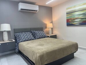 1 bedroom, desk, iron/ironing board, travel cot