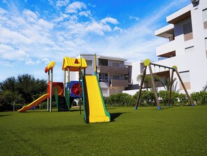 Children’s area - Charming Apt with Pool, Sea View & Large Terrace, in peaceful Imi Ouaddar (Imi Ouaddar)