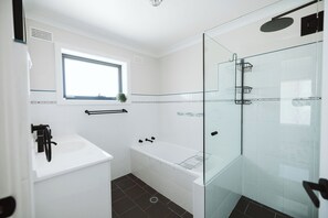 Shower, hair dryer, towels, soap