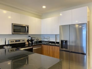 Fridge, microwave, coffee/tea maker, toaster