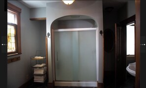Shower, hair dryer, towels, soap