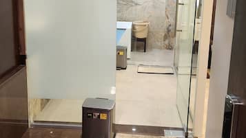 Suite, 1 Double Bed, Air conditioning, City View | Bathroom | Free toiletries, slippers, towels, soap