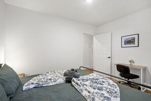 1 bedroom, desk, iron/ironing board, travel cot