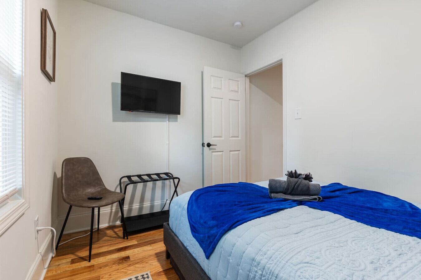 1 bedroom, desk, iron/ironing board, travel crib