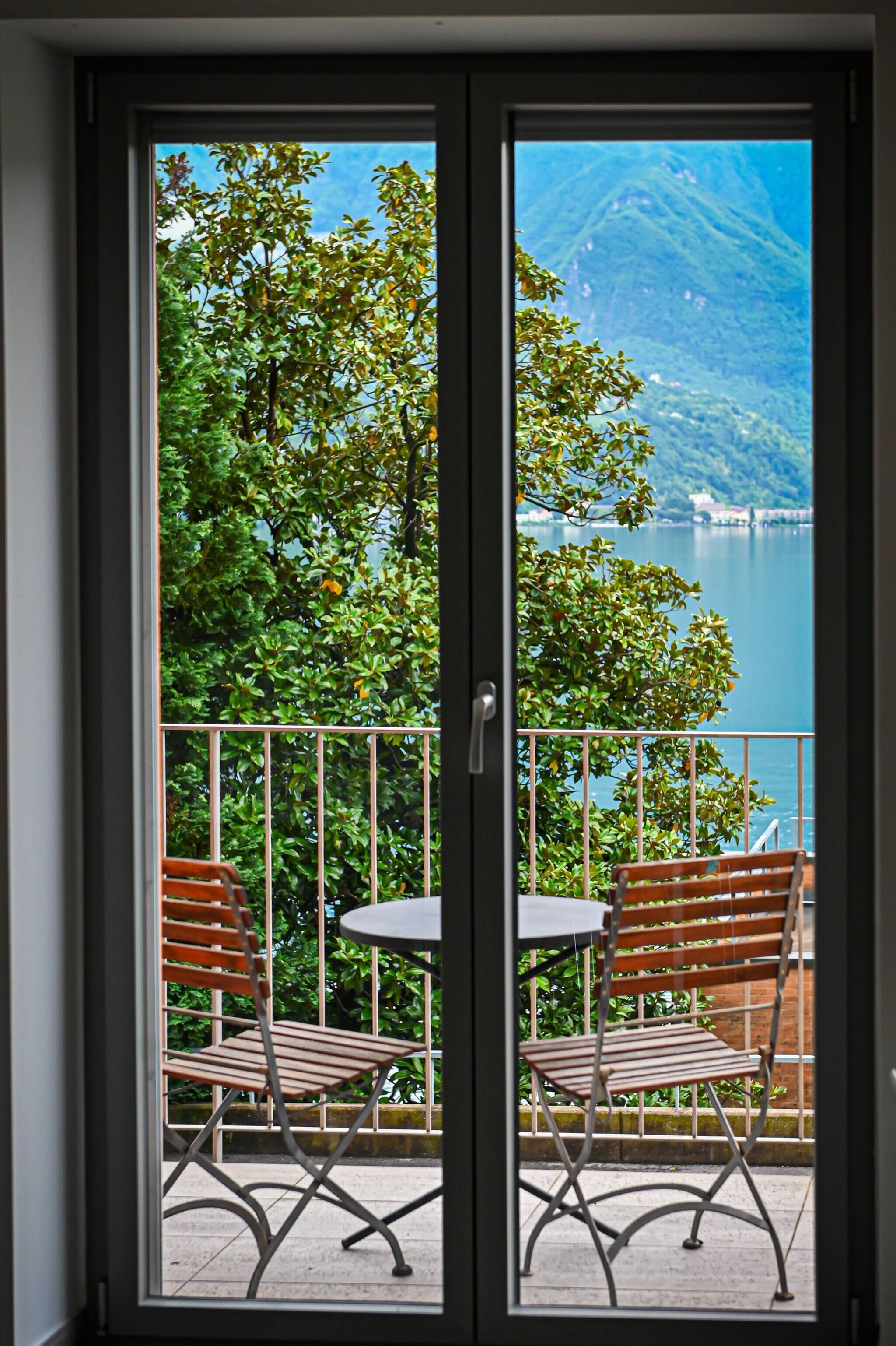 Apartment, 1 Bedroom, Balcony, Lake View | Outdoor dining