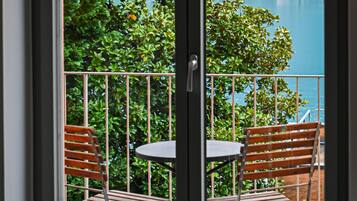 Appartamento, 1 camera da letto, balcone, vista lago | Ristorazione all'aperto