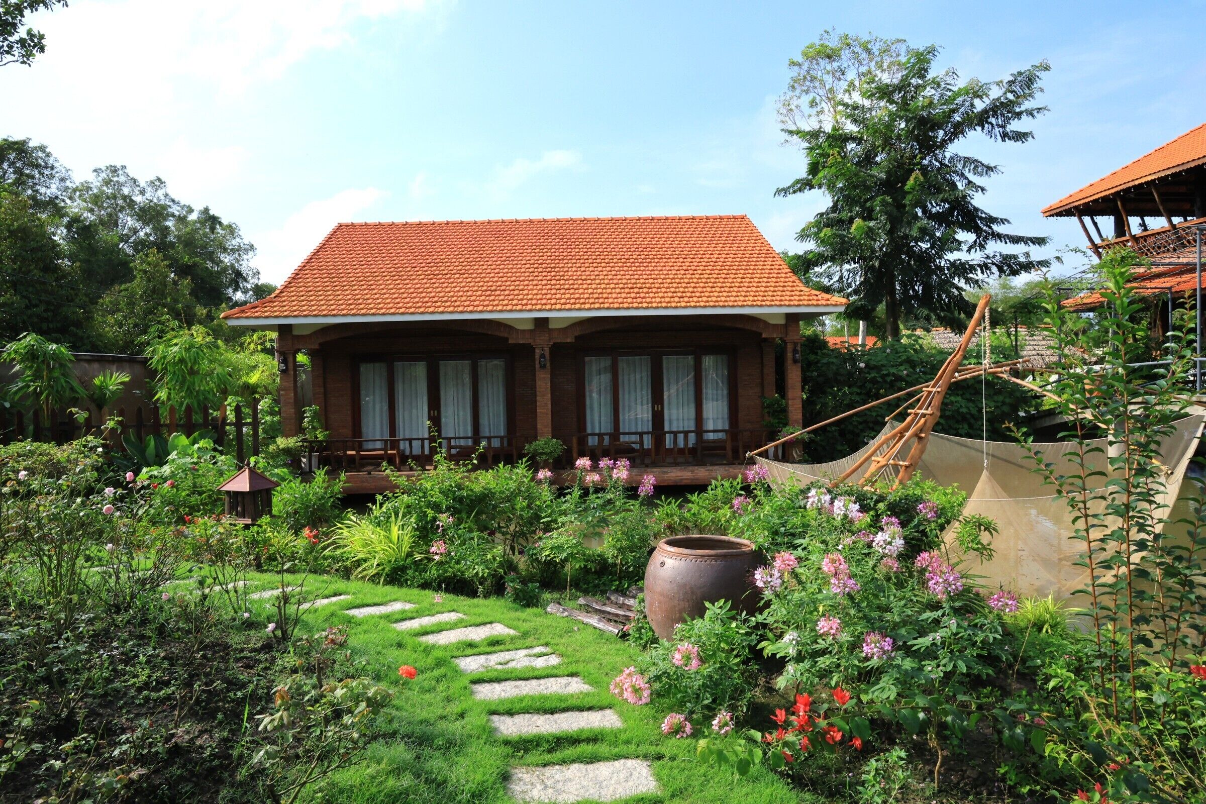 Deluxe Quadruple Room, Pool View | Front of property