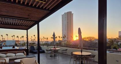 Oceanview 1-bedroom and lock off apartment in Mazatlán w pools,gardens,WiFi etc