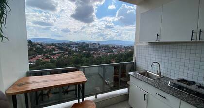Chic studio in tranquil Kigali with WiFi, centrally located, and cozy.