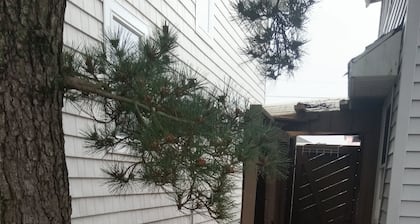 Coastal Charm Steps from the Water– Your Breezy Beach Block Bungalow Awaits!