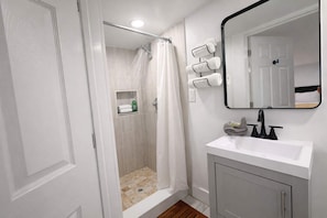 Regadera y secadora de cabello