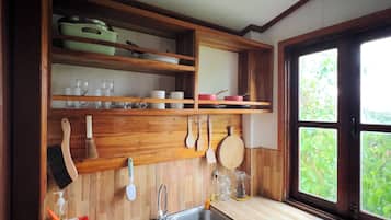 Deluxe Studio, Garden View | Private kitchen | Fridge, microwave, toaster, rice cooker
