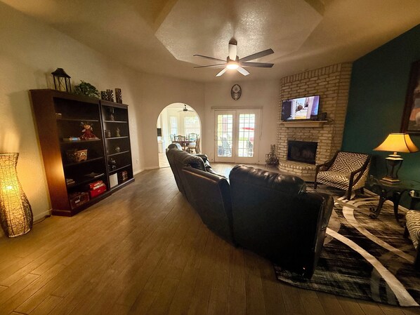 Smart TV, fireplace, books