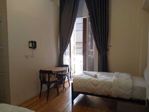 Deluxe Triple Room, Courtyard View | Hypo-allergenic bedding, soundproofing, free WiFi, bed sheets - Havana Hotel (Cairo)