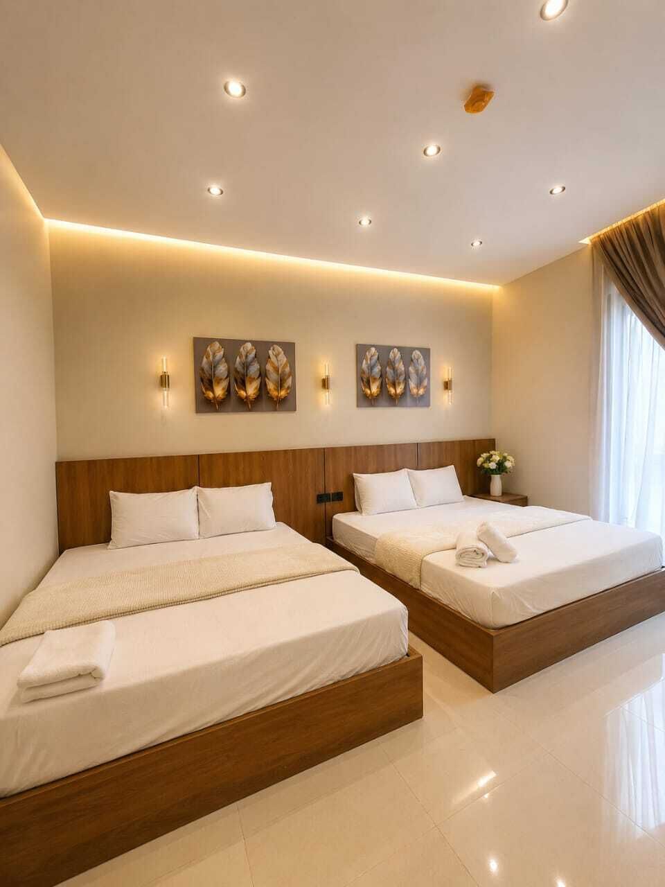 Deluxe Triple Room, Courtyard View | Living area | 32-inch LED TV with satellite channels