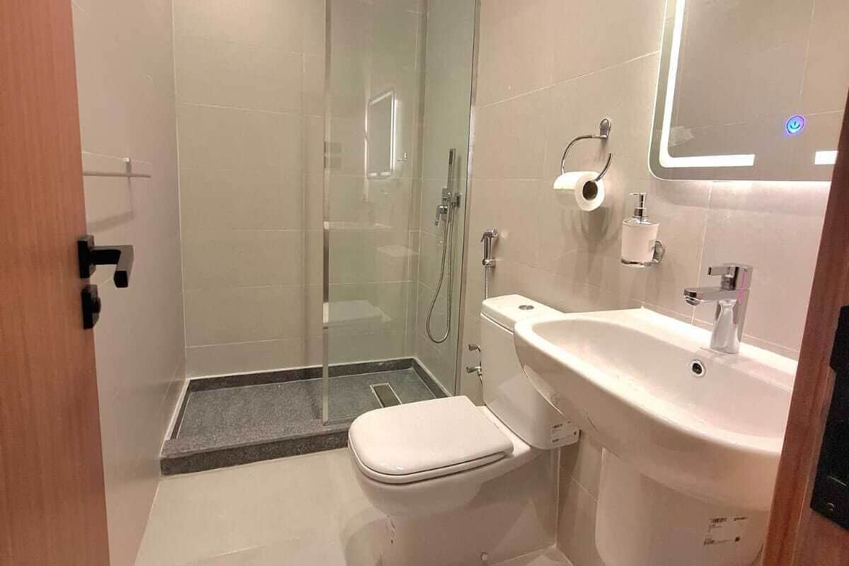 Separate tub and shower, slippers, bidet, soap
