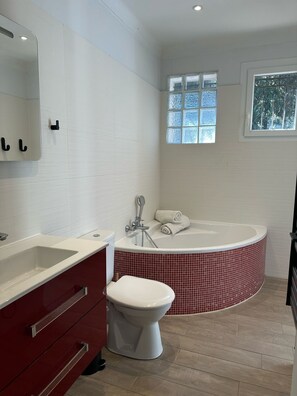 Shower, hair dryer, towels, toilet paper