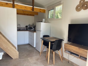 Fridge, microwave, stovetop, coffee/tea maker