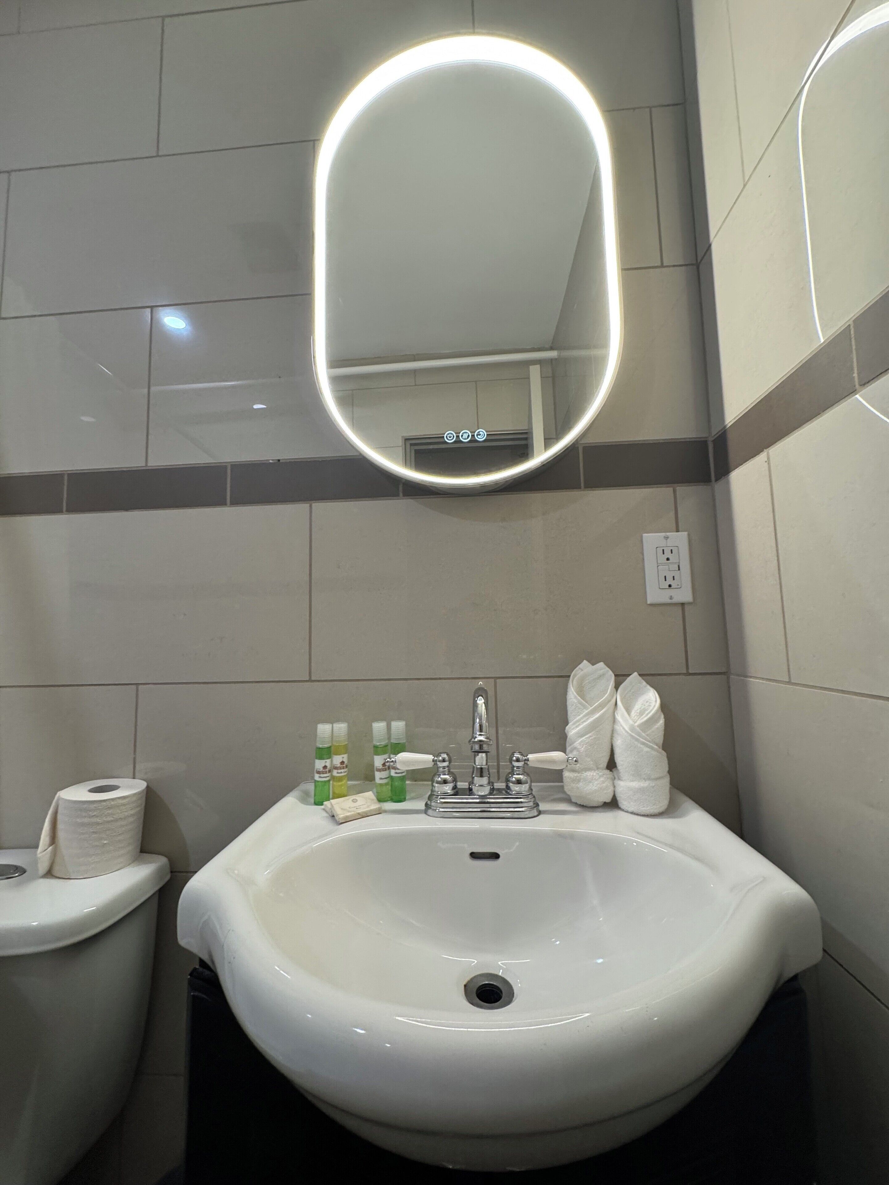 Shower, towels, soap, shampoo