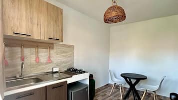 Quarto casal superior, vista para o jardim | Cozinha privada