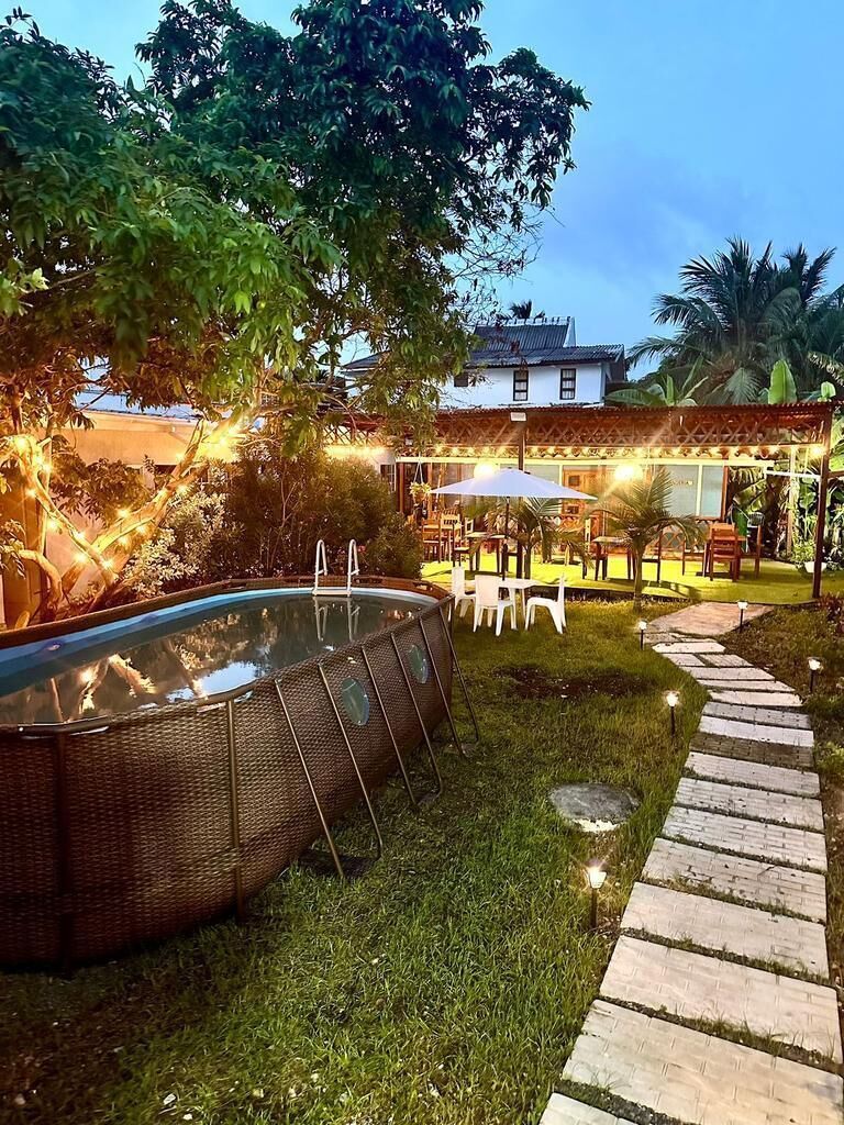 Outdoor pool, open 9:00 AM to 9:00 PM, pool umbrellas