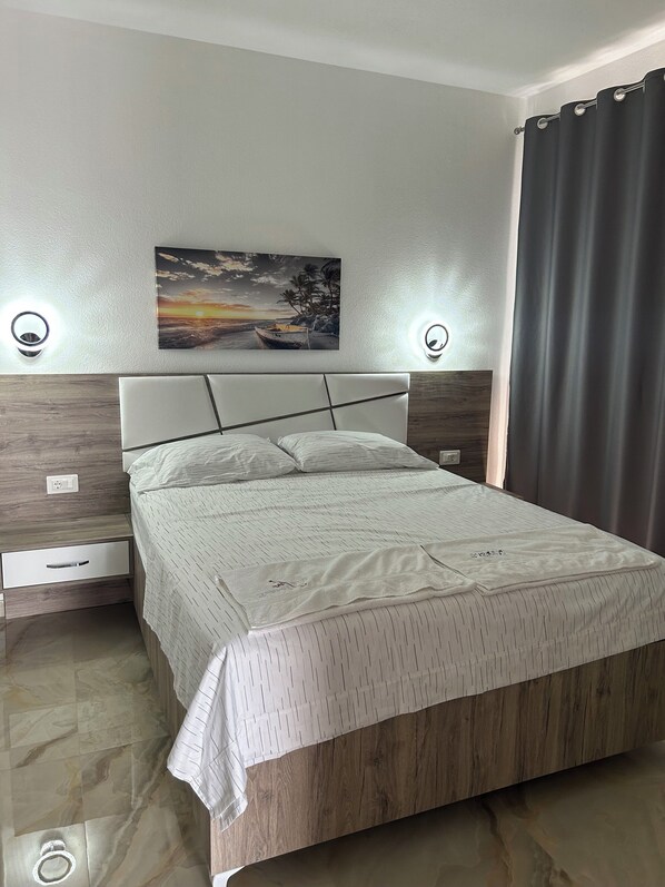 1 chambre, fer et planche à repasser, Wi-Fi, literie fournie