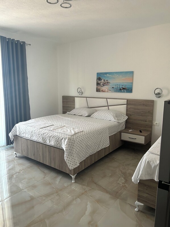 1 habitación, tabla de planchar con plancha, wifi y ropa de cama 