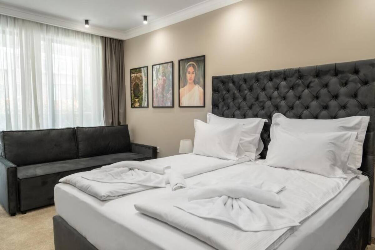 Deluxe Double Room, Balcony | In-room safe, iron/ironing board, free WiFi