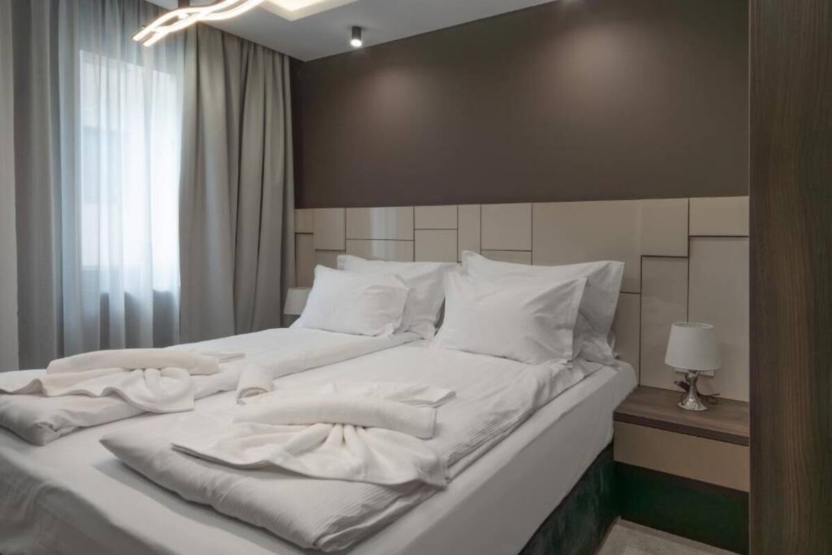 Deluxe Apartment, Balcony | In-room safe, iron/ironing board, free WiFi