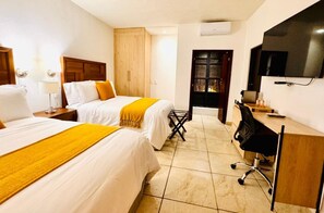 Deluxe Twin Room, City View | In-room safe, desk, laptop workspace, blackout drapes