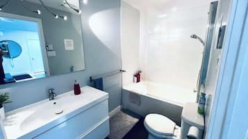 Shower, hair dryer, shampoo
