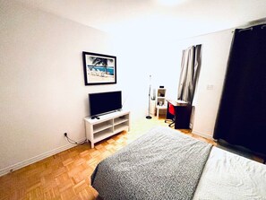 2 bedrooms, desk, iron/ironing board, travel crib