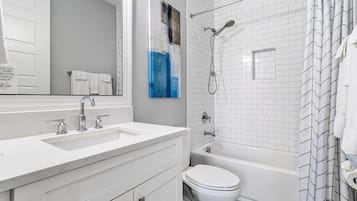 Hair dryer, towels, soap, shampoo