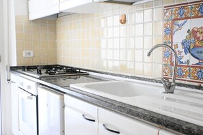 Fridge, oven, dining tables