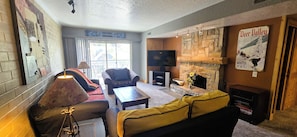 Smart TV, fireplace, DVD player, books