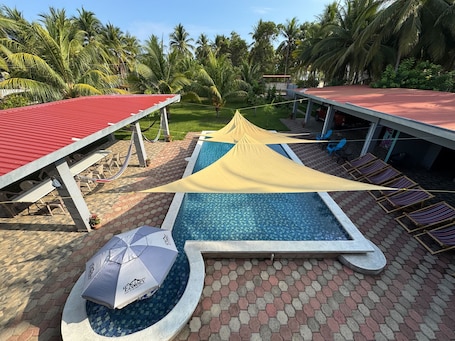 Outdoor pool. Calypso Ranch in Garita Palmera