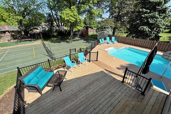 Resort style backyard with pool, pickleball court, putting green, and more!