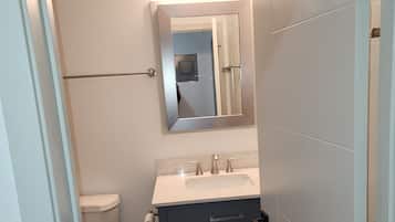 Hair dryer, towels, soap, toilet paper