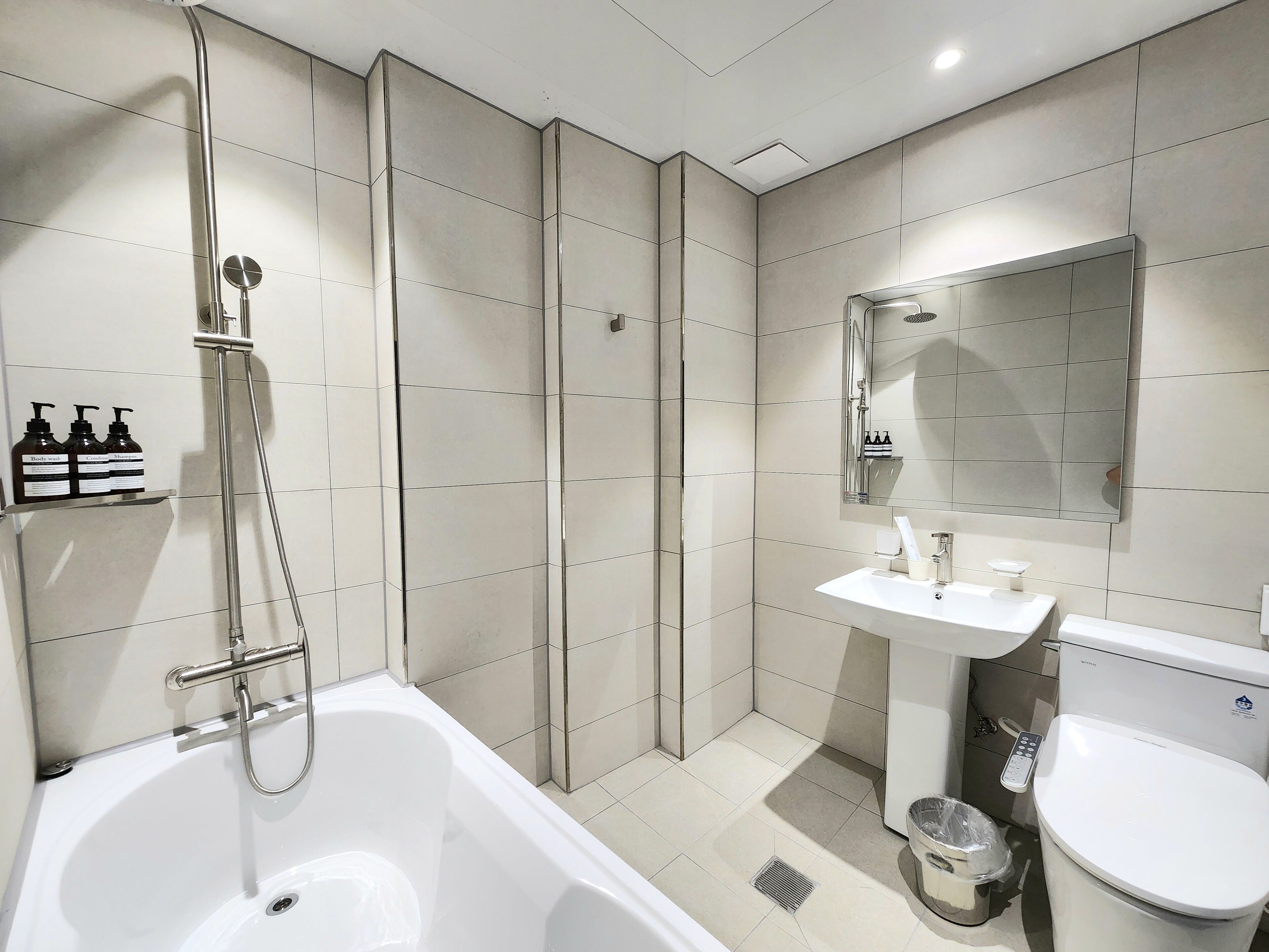 Hair dryer, towels, soap, shampoo