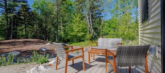 Charming 2-bedroom apartment nestled in a quiet neighborhood with nearby stream.