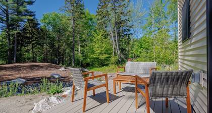Charming 2-bedroom apartment nestled in a quiet neighborhood with nearby stream.