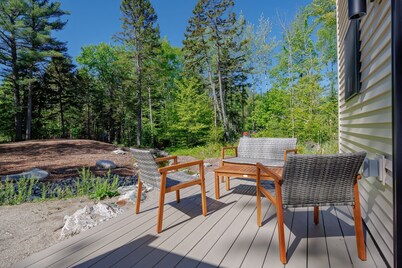 Charming 2-bedroom apartment nestled in a quiet neighborhood with nearby stream.